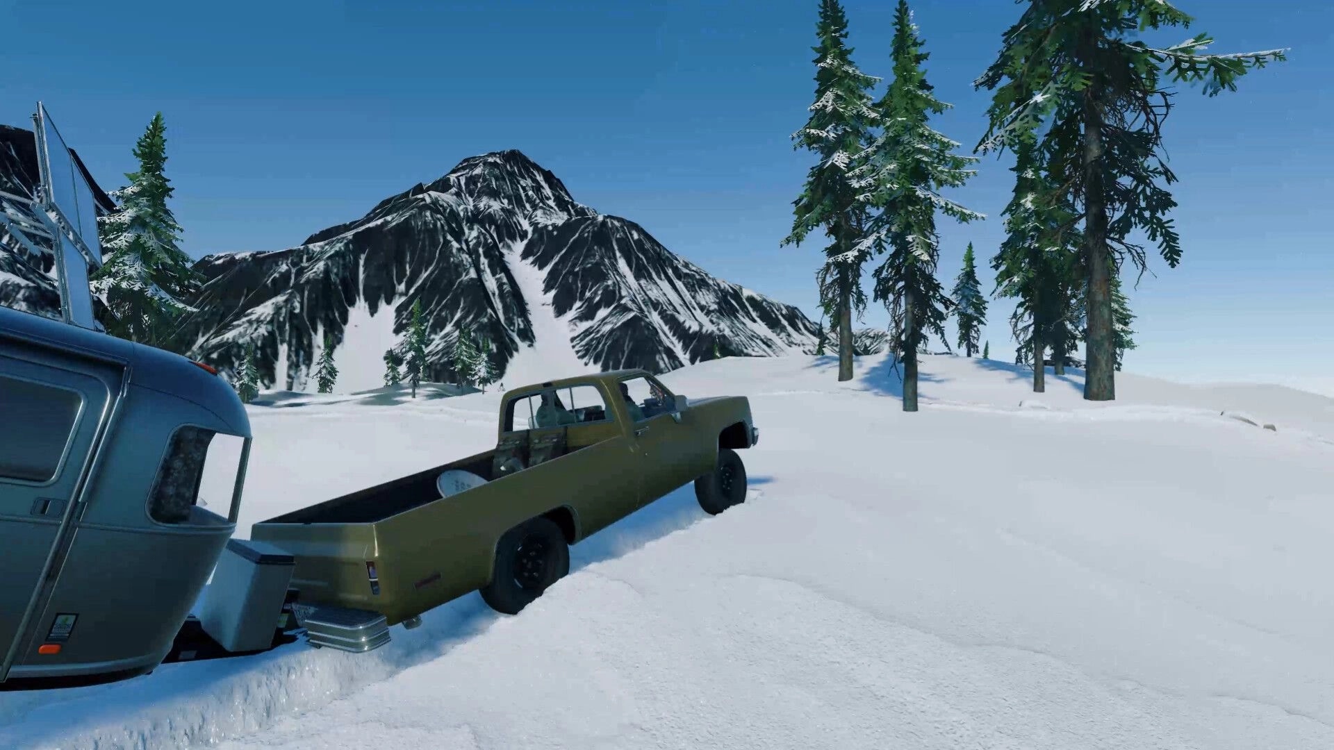 Arctic Drive: Pickup truck parked in deep snow beside a camper, with pines and snowy mountain ahead.