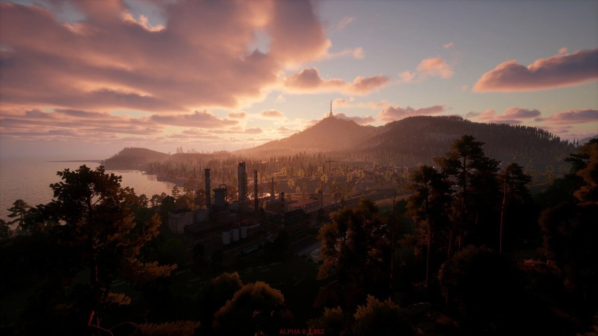 Ardem: Expansive industrial landscape at sunset with distant mountains and a calm coastal view