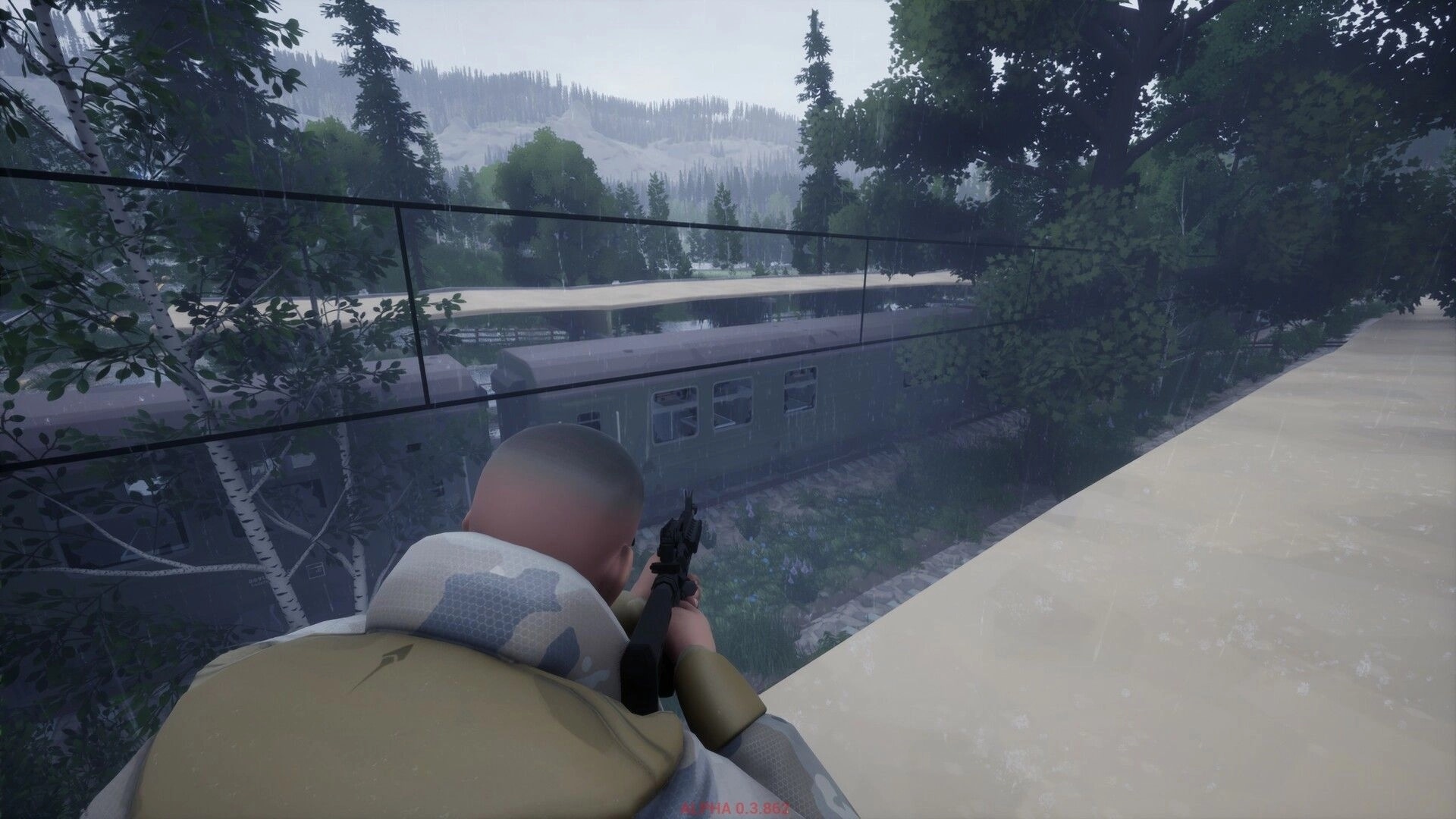 Ardem: Player aiming rifle from rooftop at train in dense, rainy forest environment