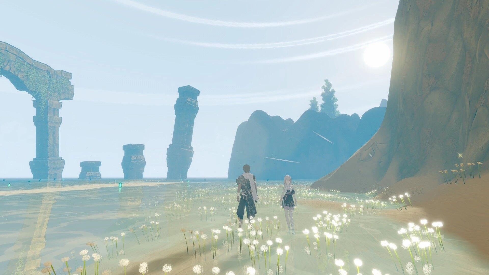 ARIE: Two characters explore a sunlit, flower-filled landscape with ancient stone ruins by the ocean.