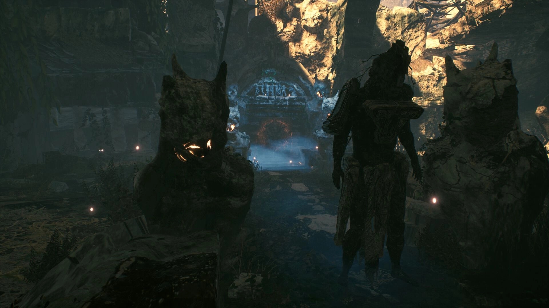 ASTHENIA: Hooded figure stands by grotesque statues in a misty cavern facing a glowing gate.