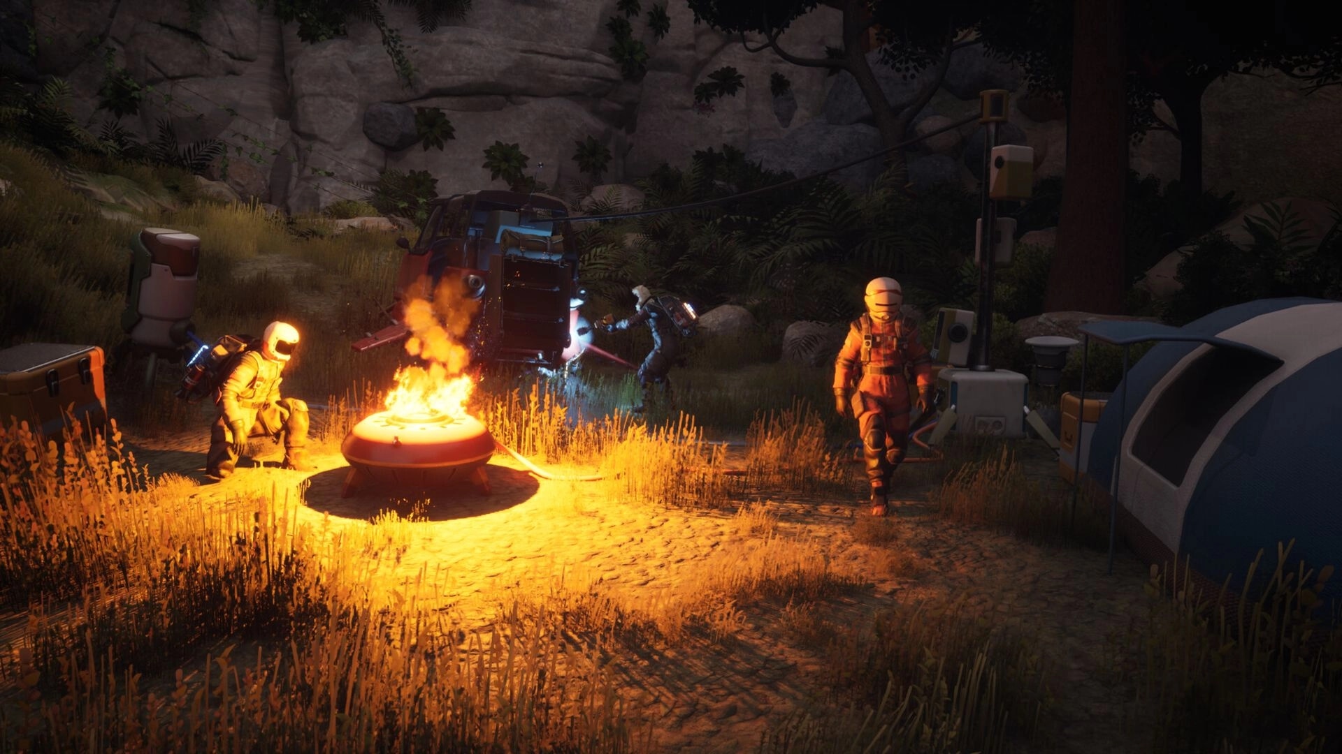 ATMOSFAR: Co-op astronauts at a campfire beside a landed craft and tents in rocky forest clearing.