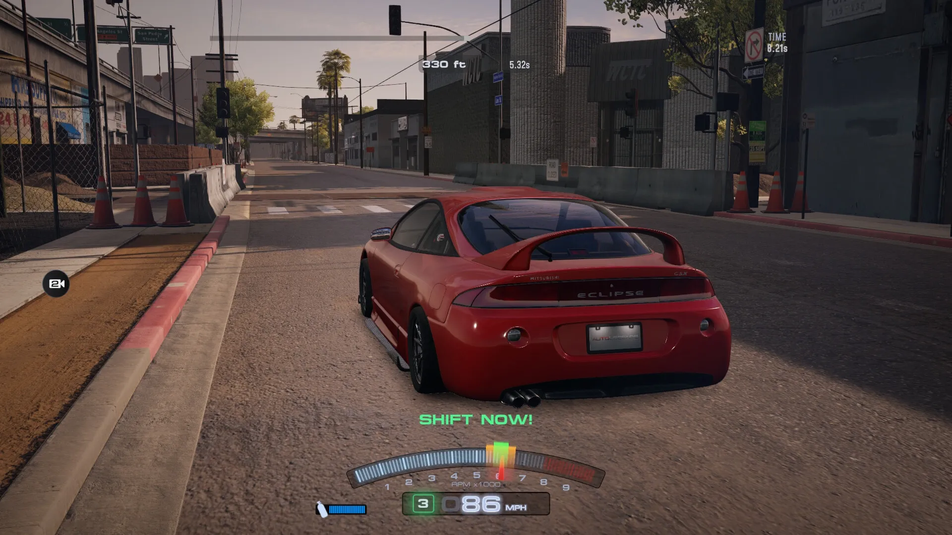 Auto Legends: Red car speeding through urban street with "Shift Now!" prompt and speedometer visible