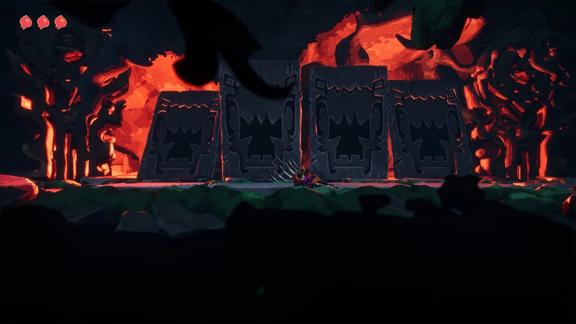 Ayna: Character lies on stone floor with spikes, surrounded by glowing red cavern walls and stone blocks.