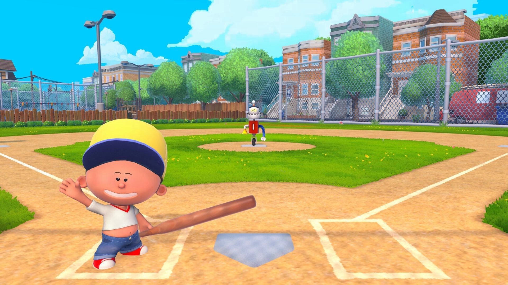 Backyard Baseball: Smiling batter waves at home plate facing robot pitcher on a sunny city ballfield.