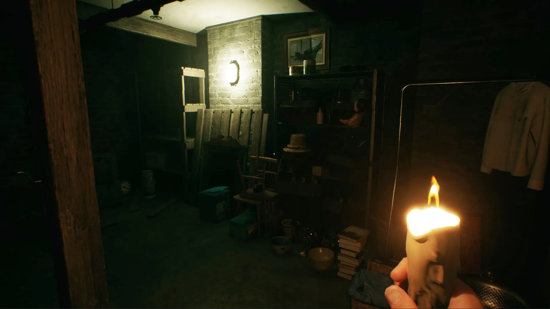 Baptiste: Exploring a dimly lit basement holding a candle, with shelves and clutter in the background.