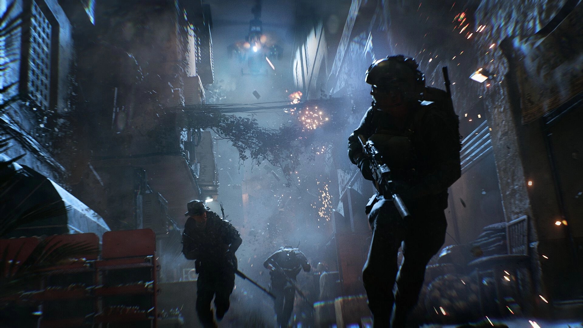 Battlefield™ 6: Soldiers sprint through a narrow, debris-filled alley as explosions light up the night sky.