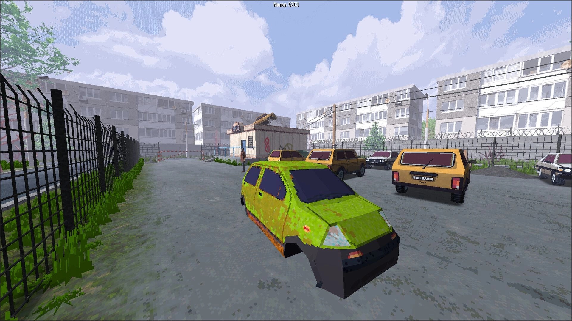 BeaterCore: Rusty green car parked in residential area with apartment blocks and parked beaters