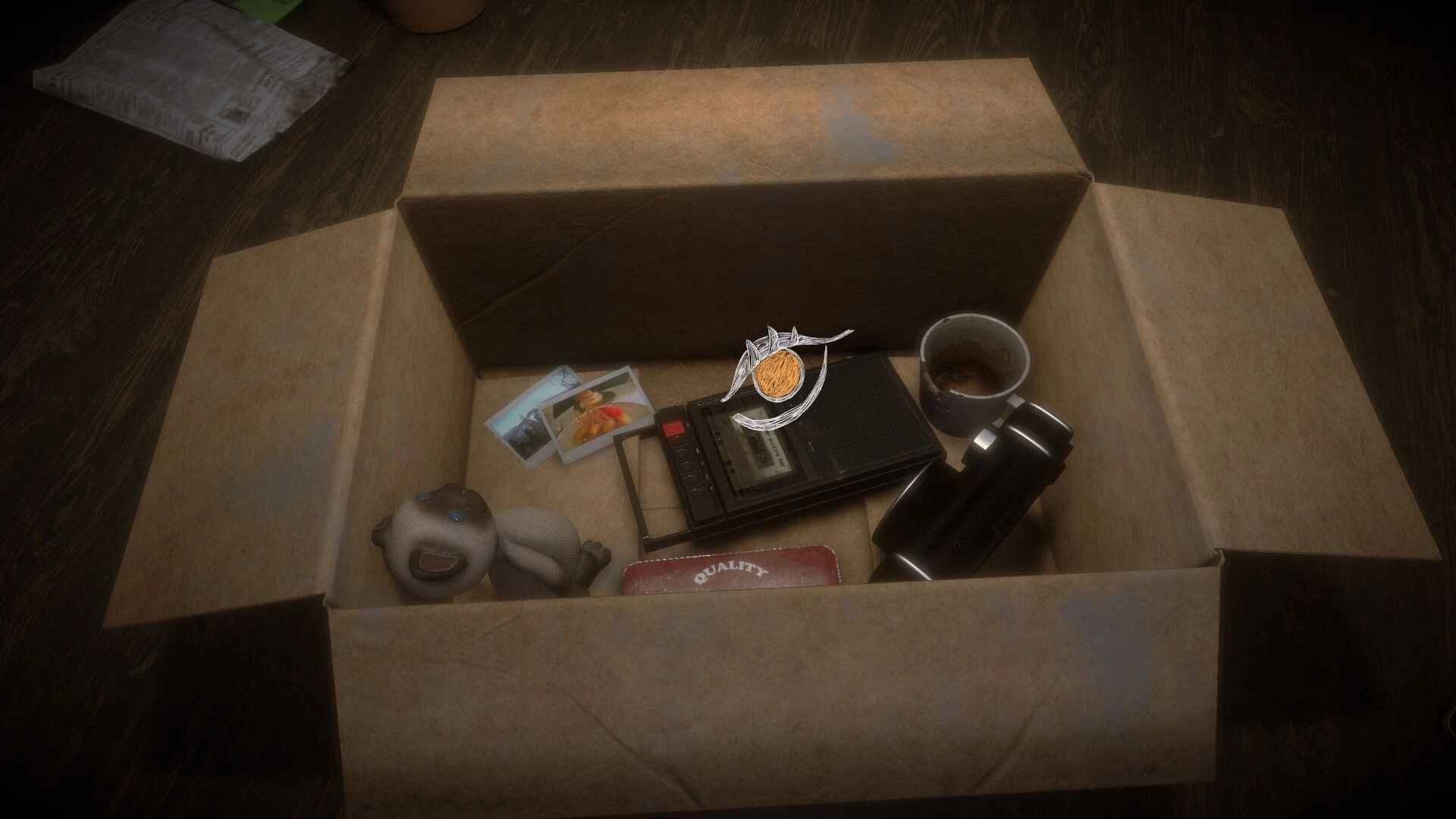 Before Closure: Open box of mementos with photos, teddy, tape recorder and mug on wooden table.