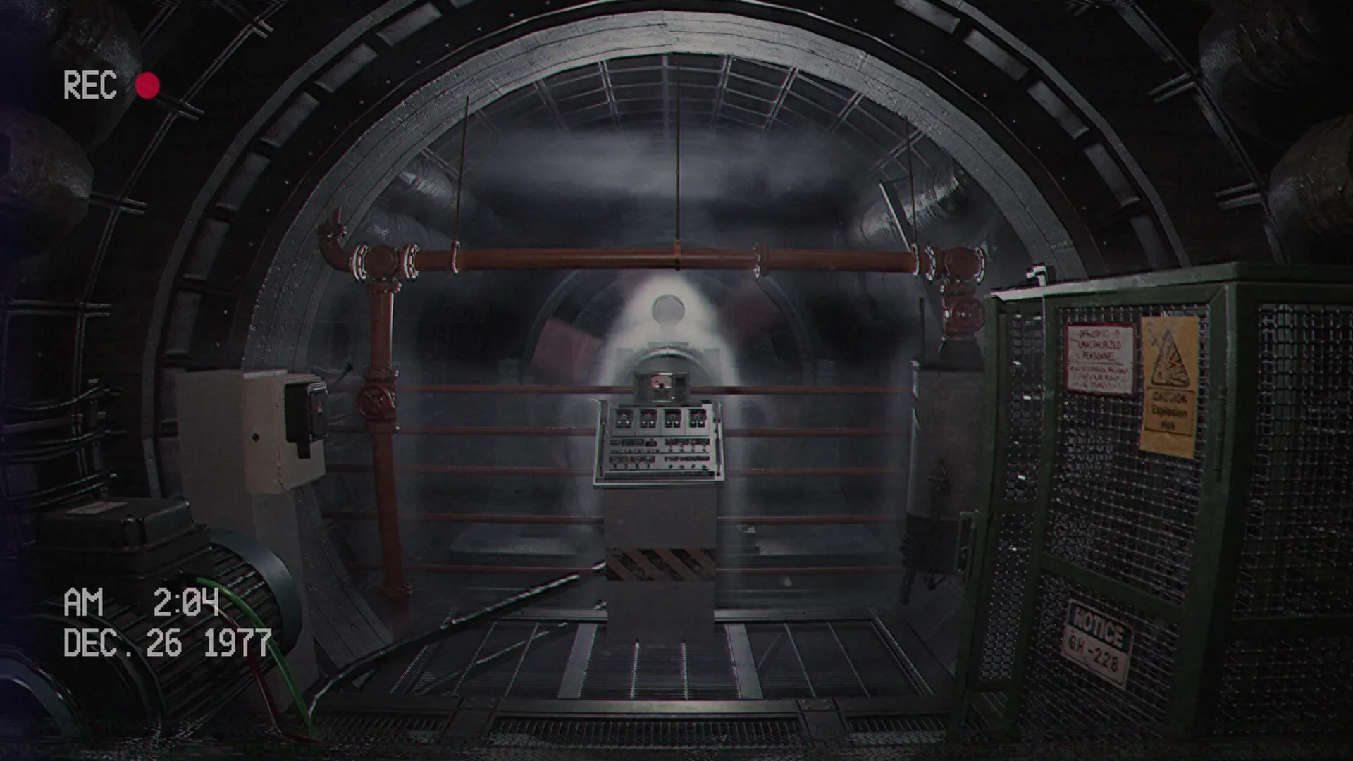 Below, Rusted Gods: Dimly lit tunnel with control panel and warning signs in industrial facility