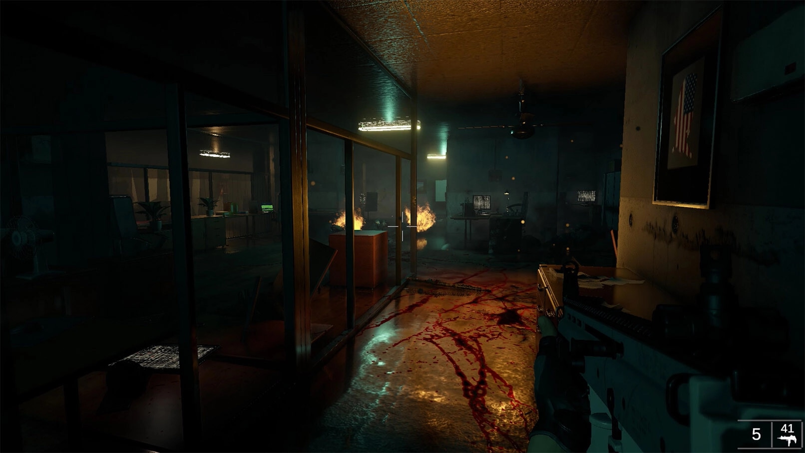 Beneath: Noah Quinn explores a dimly lit office with burning debris and a blood-stained floor.