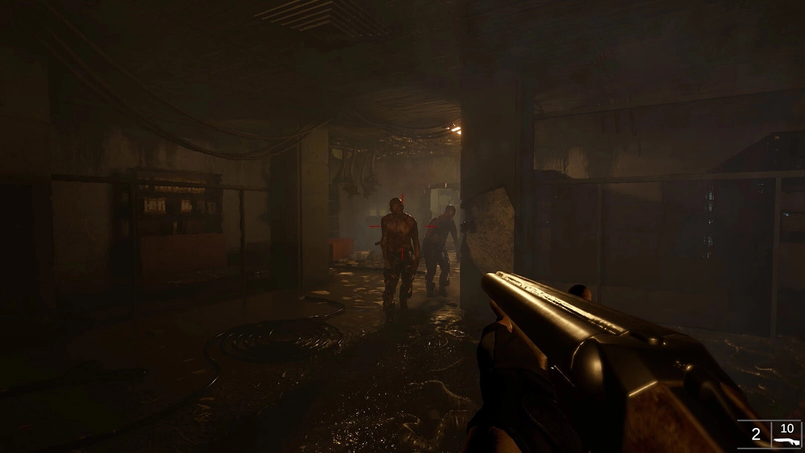Beneath: Noah Quinn aims shotgun at approaching creatures in dark, flooded hallway with dim lighting