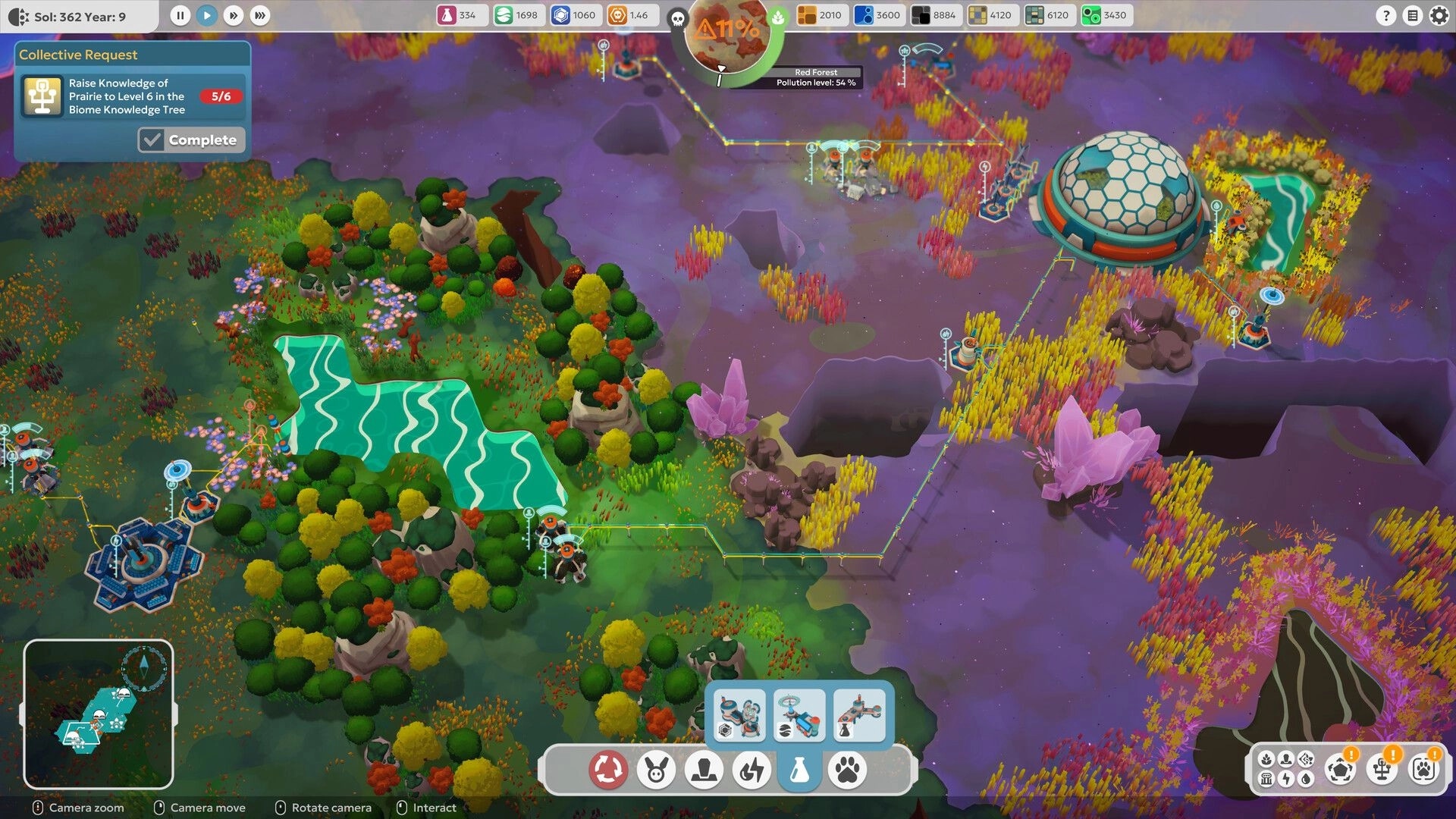 BioEden: Base overview with dome habitat and power lines across colorful biomes and lakes map view.