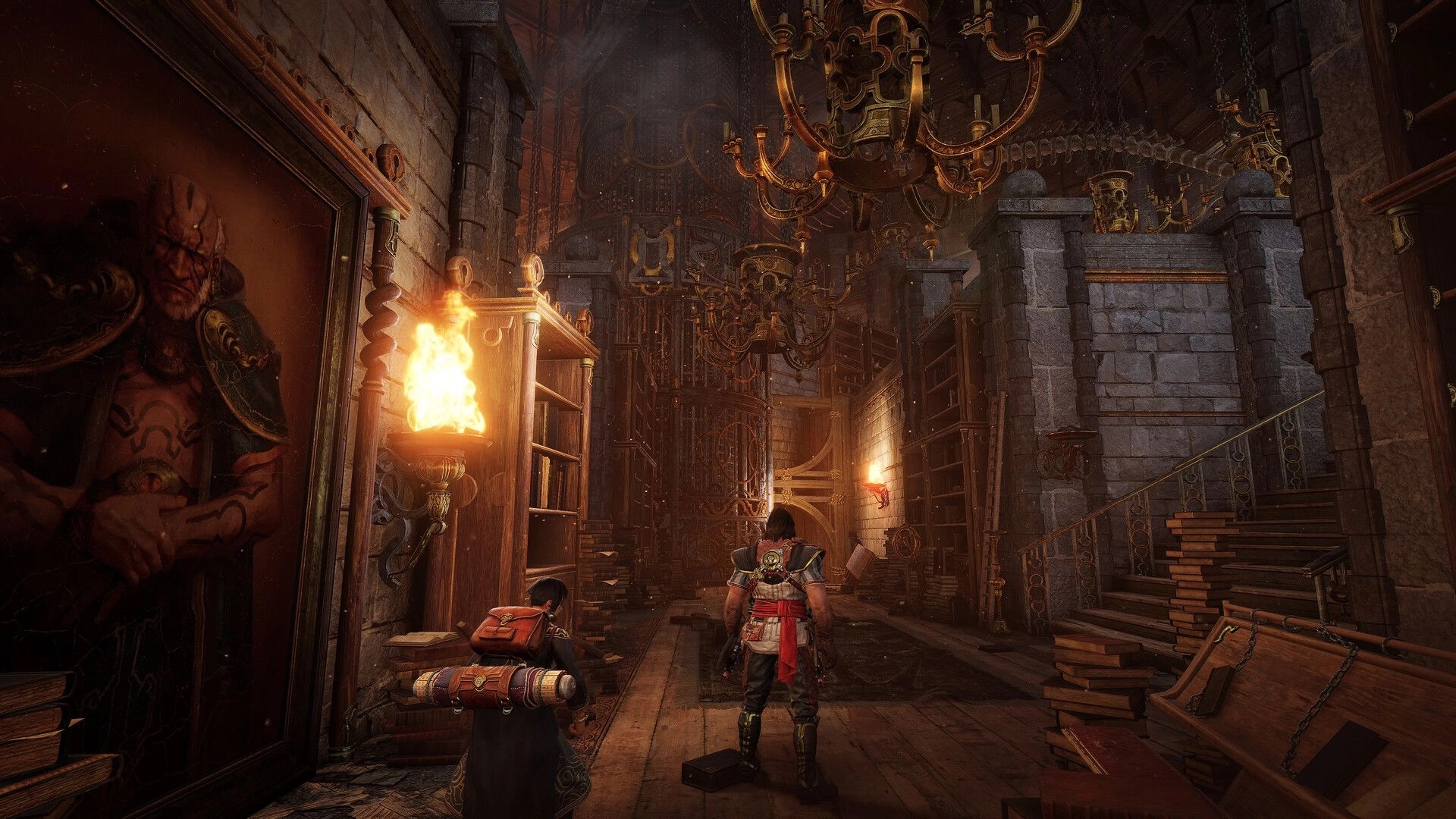Blades of Fire: Player and companion explore a torchlit library hall with chandeliers and bookshelves.