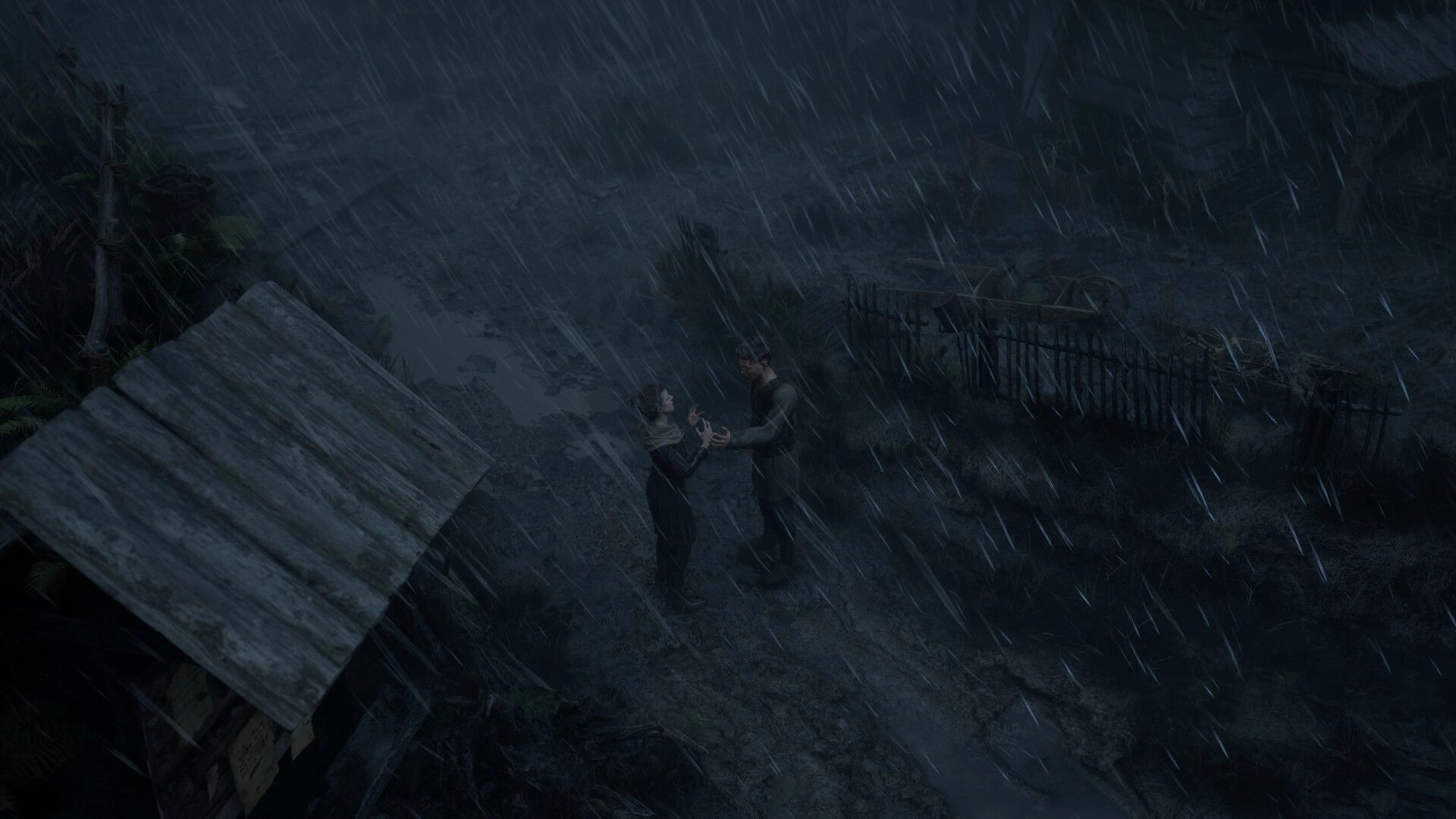 Bleak Haven: Two characters conversing in the rain amidst dark, muddy ruins and wooden structures.