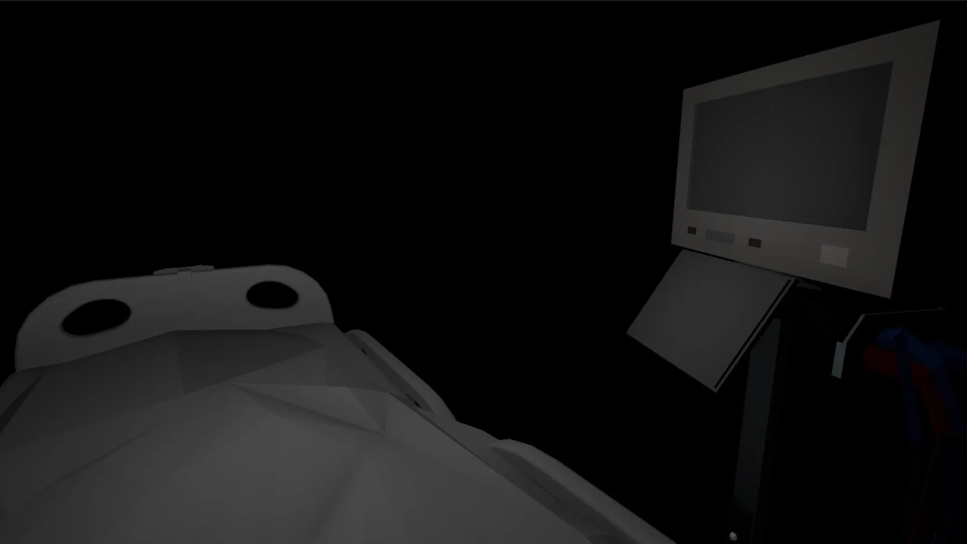 Blind Touch: Hospital bed and monitor in a dark room, highlighting sensory deprivation experience