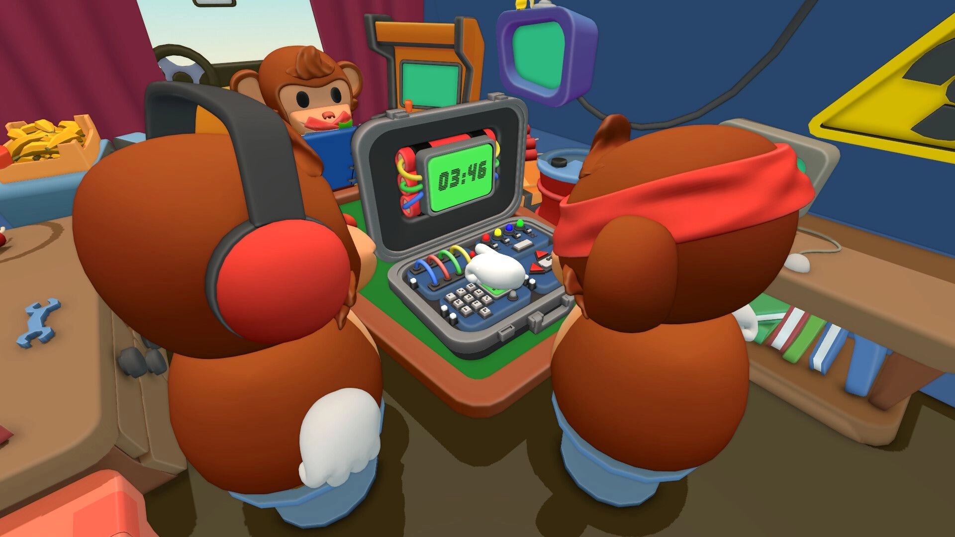BOMBANANA!: Three monkeys crowd a bomb console with timer 03:46 and colored wires inside van workshop.
