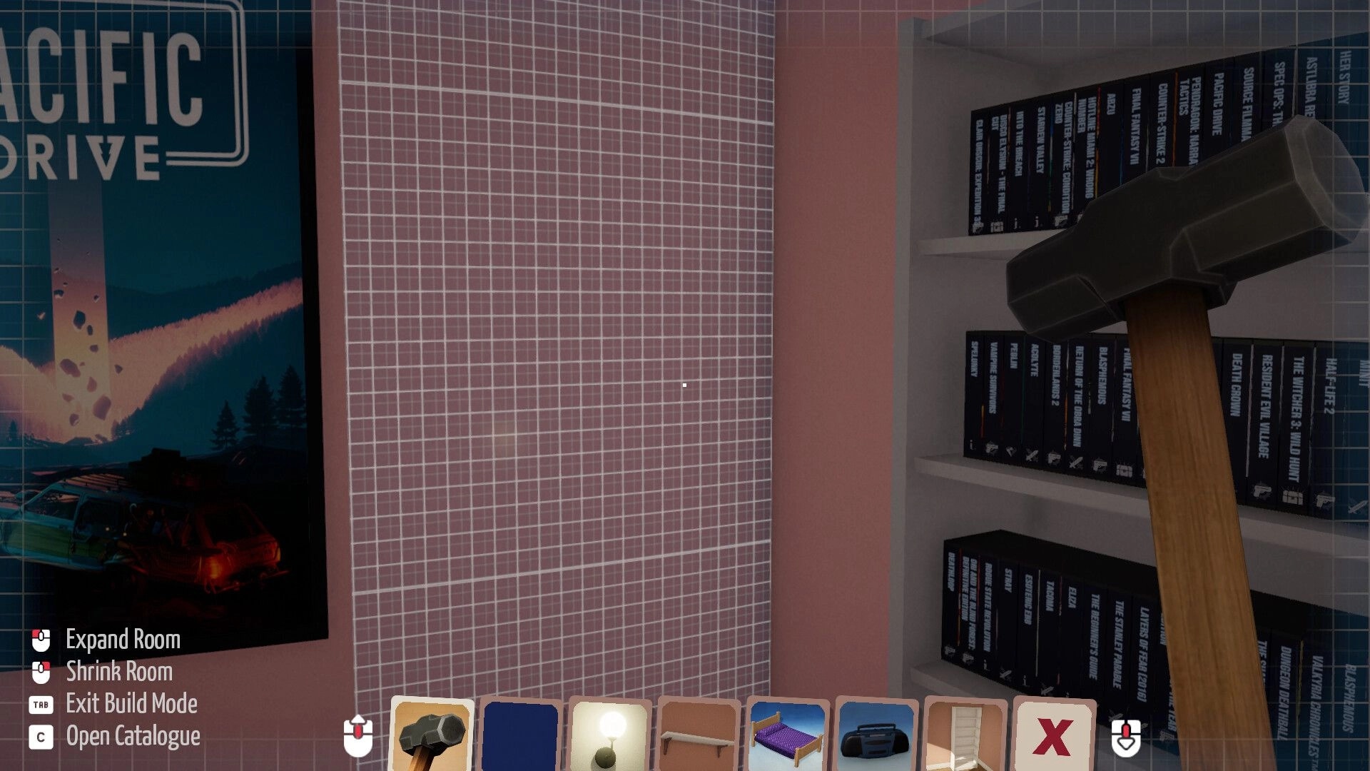 BOXROOM: Hammer tool selected in build mode, placing wall grid beside a game-filled bookshelf in room.