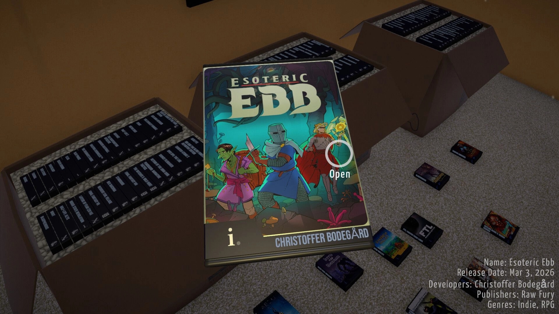 BOXROOM: Selecting Esoteric Ebb box art with Open prompt beside moving boxes on carpeted floor.