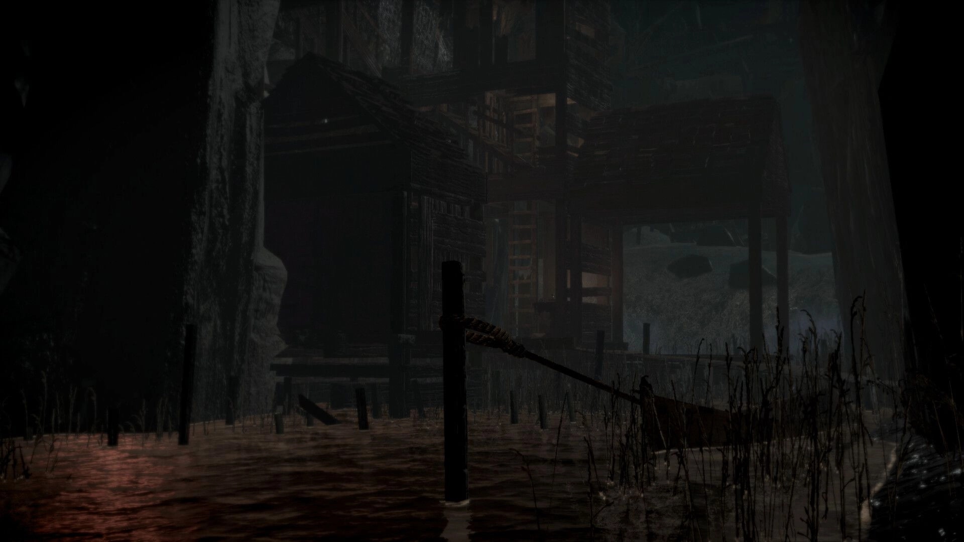 BRAMBLEFORT: Rainy night view of a rotting wooden hut on stilts beside flooded marsh grass.