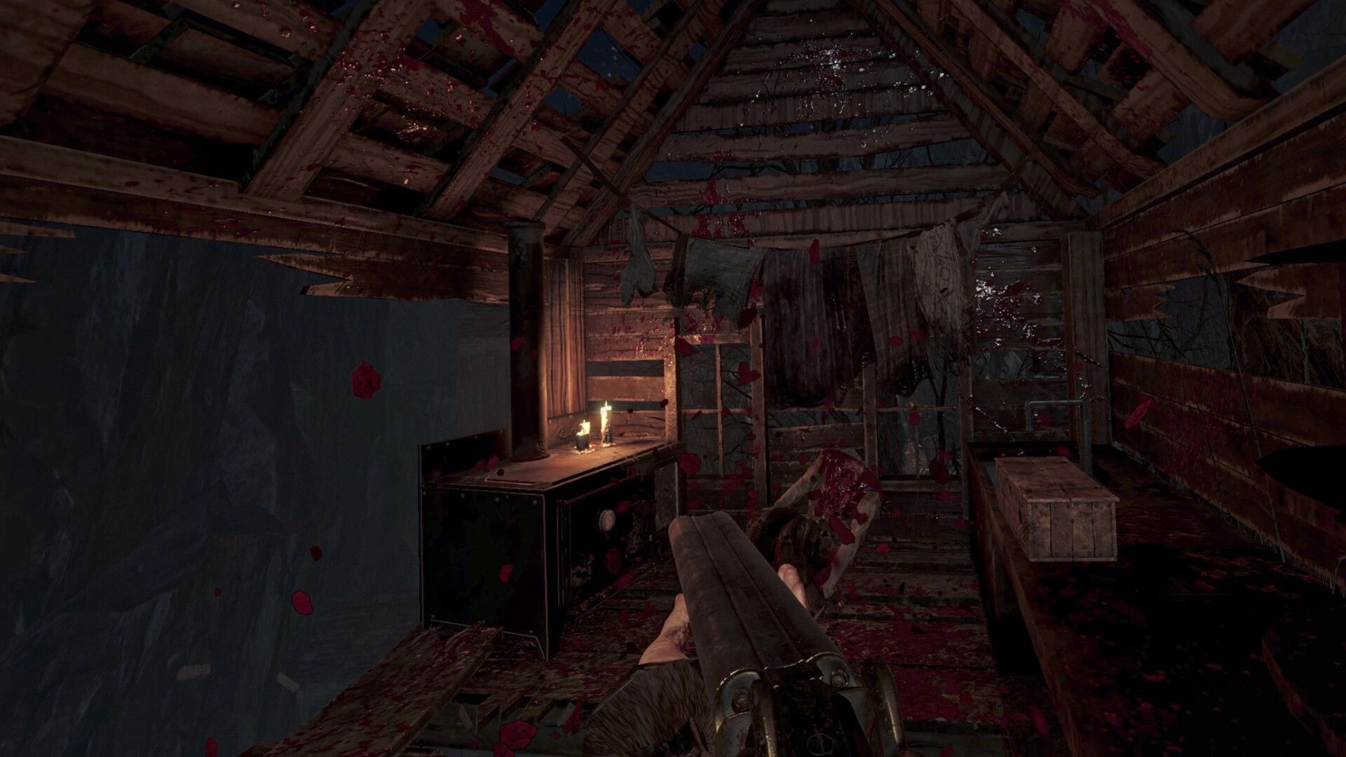 BRAMBLEFORT: First-person shotgun aimed in a blood-splattered wooden hut lit by candles and hanging cloths.
