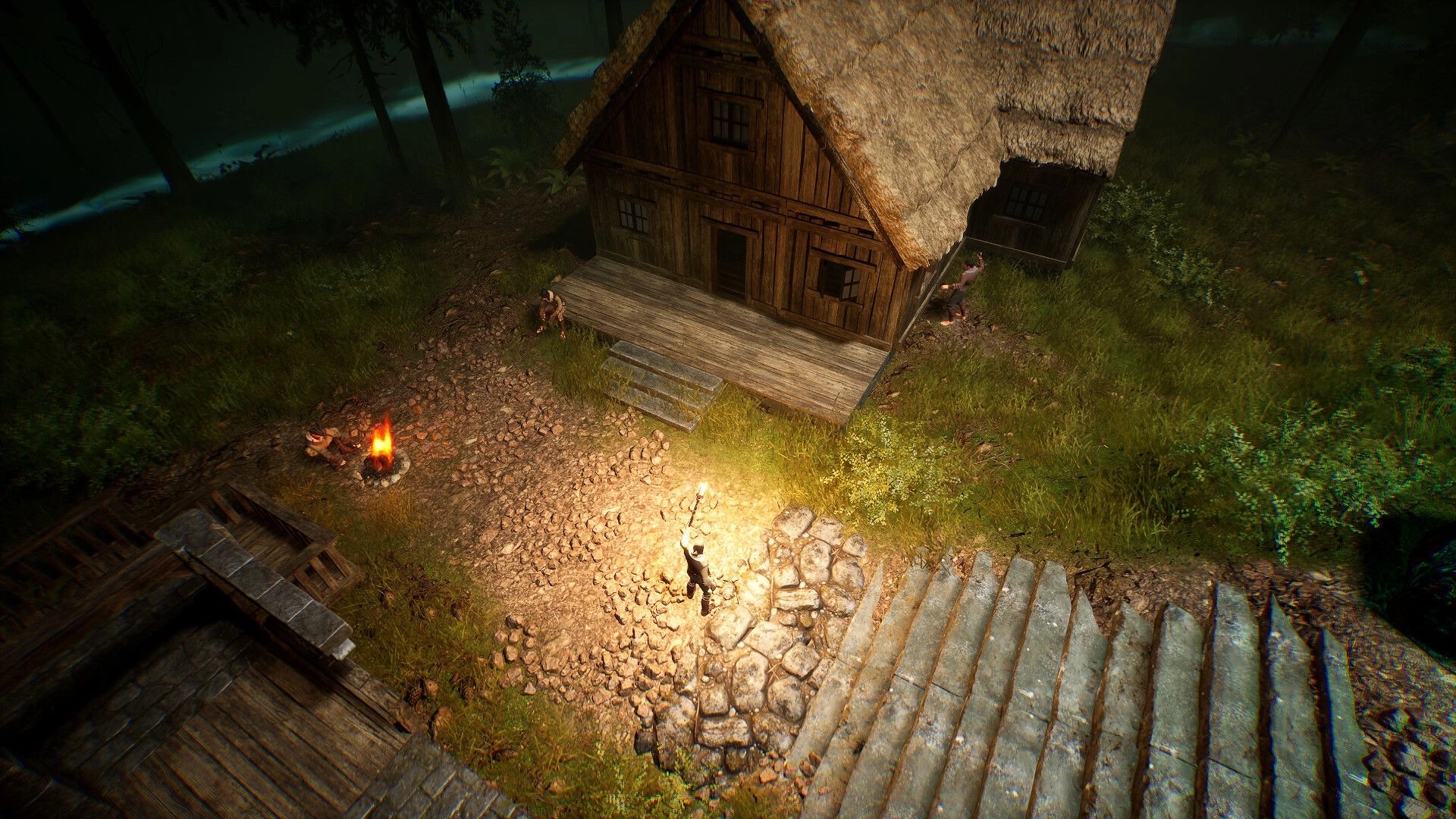 Brightfall: Player holds a torch near a cabin and campfire in a dark forest clearing at night.