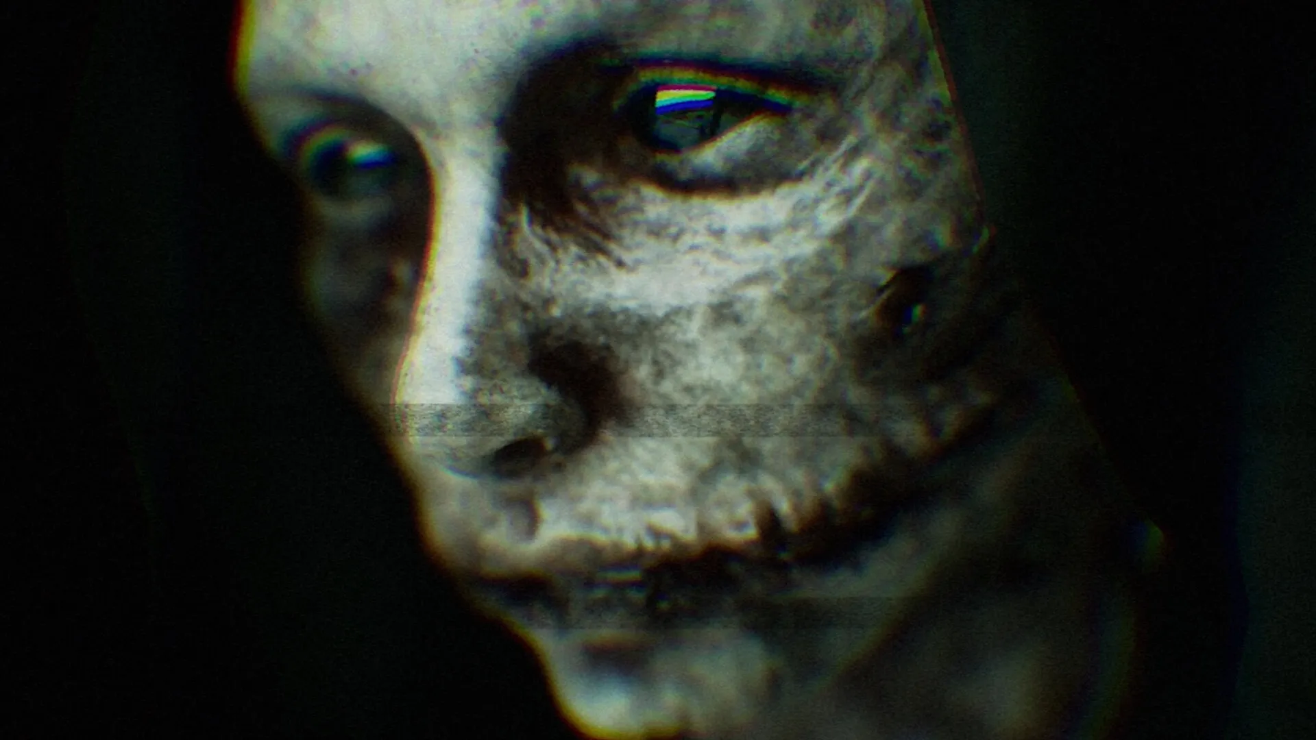 BrokenLore: Close-up of a sinister, distorted face in a dark, eerie environment