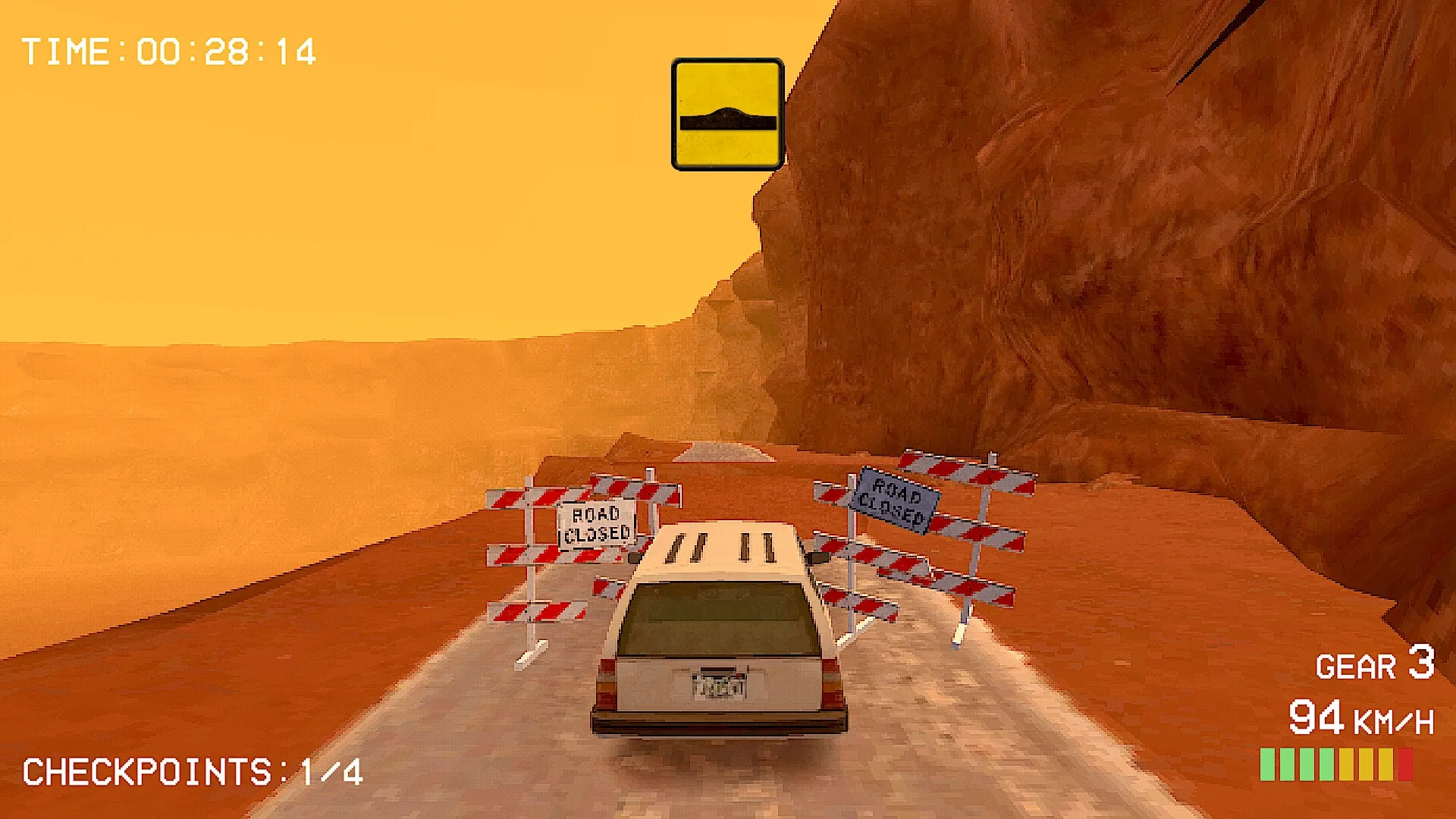 Budget Rally: Station wagon navigating roadblocks on a narrow desert canyon track at high speed