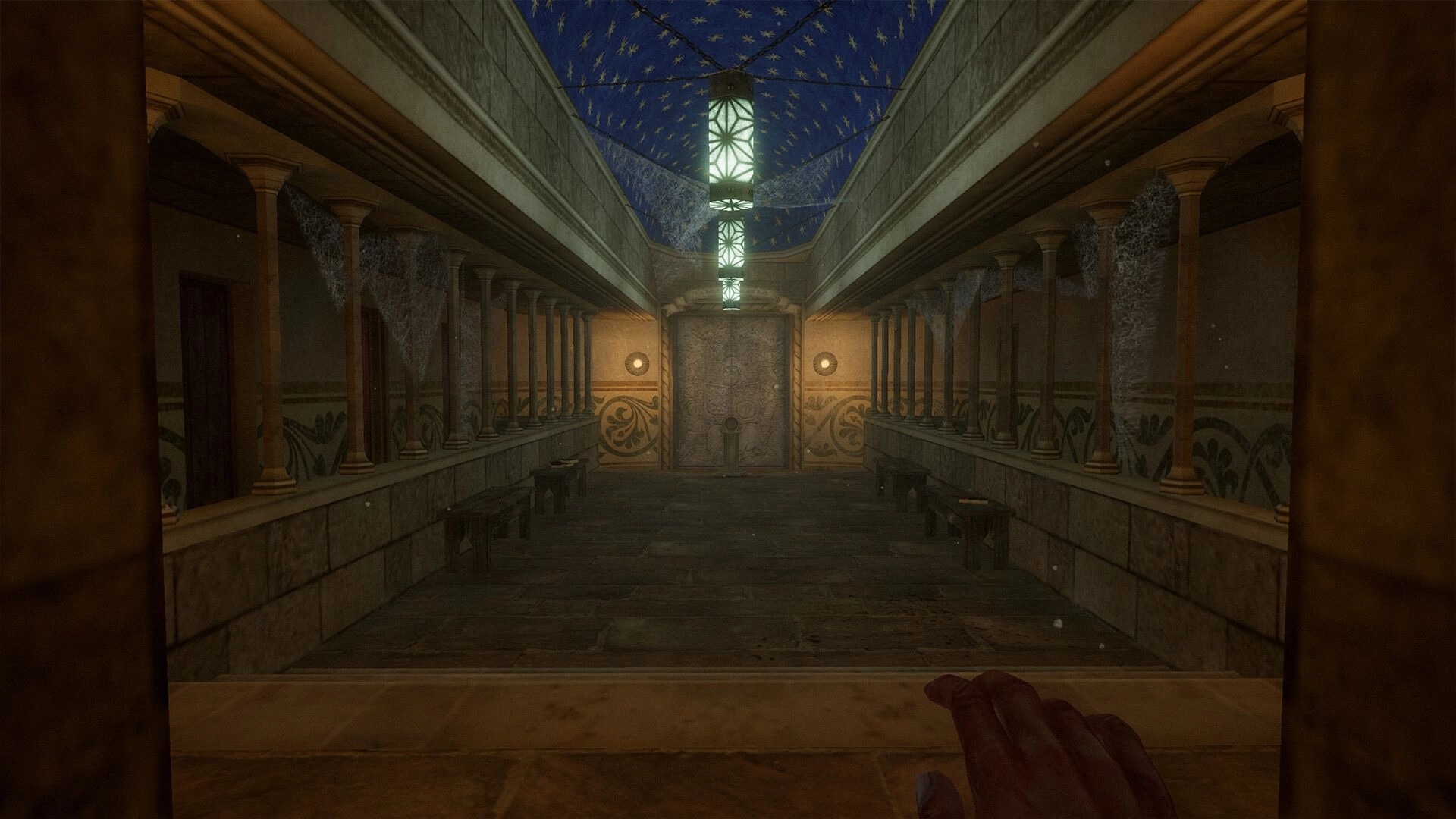 Caput Mortum: Player explores a dimly lit corridor with cobwebs and a locked ornate door in the tower.