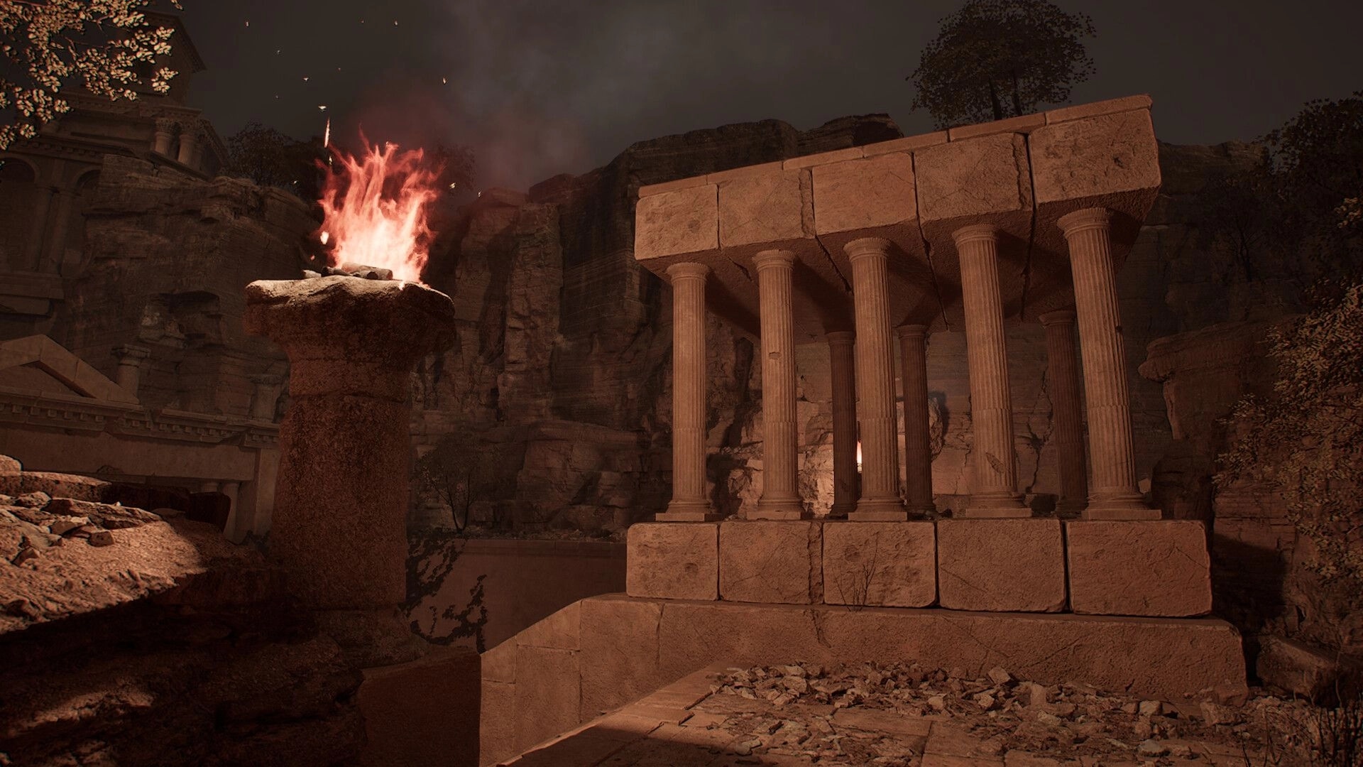Carcerem: Stone pillar with flames beside ancient temple ruins in a dimly lit labyrinth cave setting.