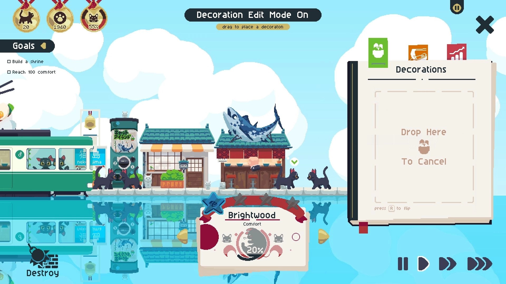 Cat Isle: Decoration edit mode with decorations book open over seaside town street and cats by shops.