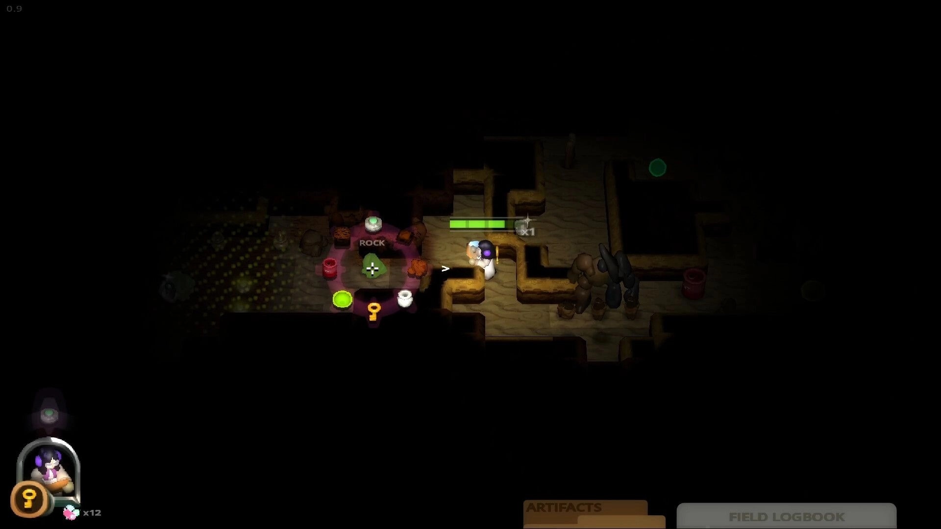 Cavern: Player aims while swap wheel highlights ROCK, exploring narrow tunnels with rocks and barrels.