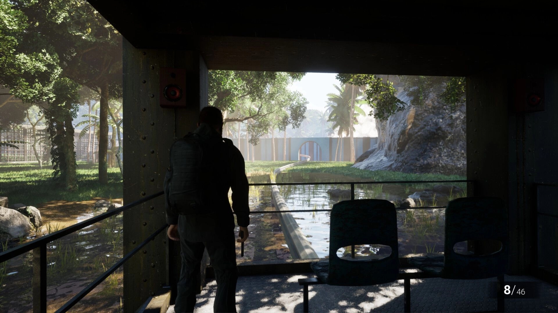 Clawed: Character in dark corridor overlooking lush park with waterway, ammo count displayed in corner