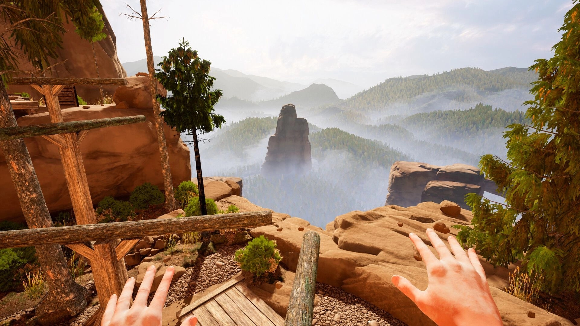 CLIMB IT!: First-person view of hands reaching toward a distant mountain peak amidst lush forest landscape.