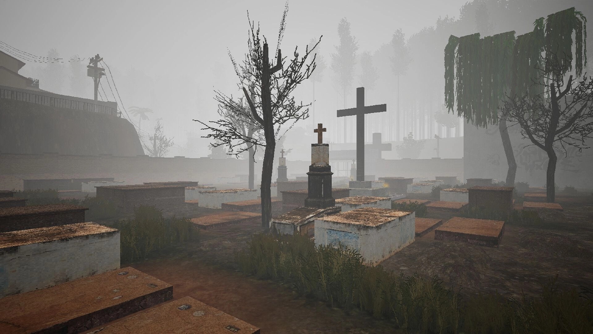 Comatose: Foggy graveyard with stone tombs and cross monuments amid leafless trees and weeds.