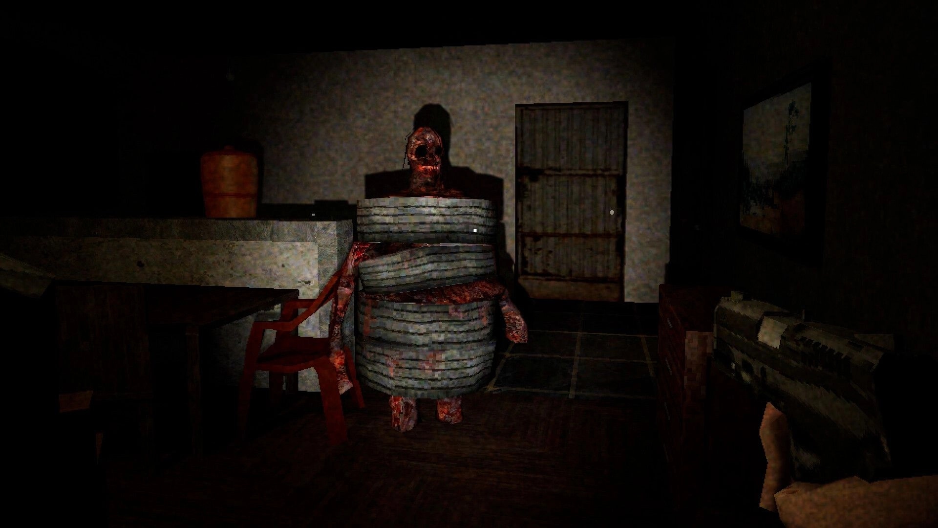 Comatose: First-person view aiming gun at bound, bloodied figure in a dim room by a door.