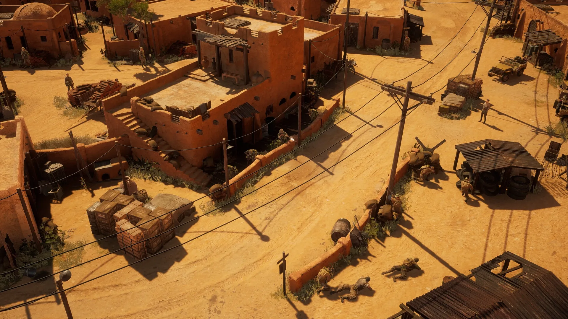 Commandos: Soldiers stealthily navigate desert village, utilizing cover from buildings and crates.