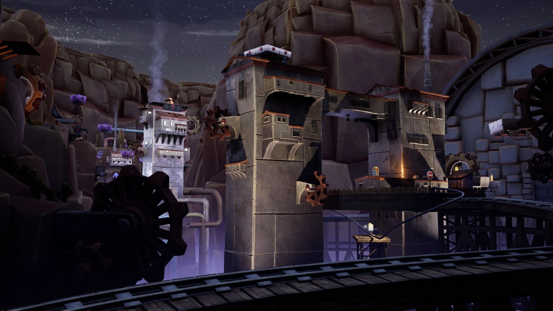 Conductor Cat: Train tracks curve past smokestacks and giant gears in a rocky canyon at night.