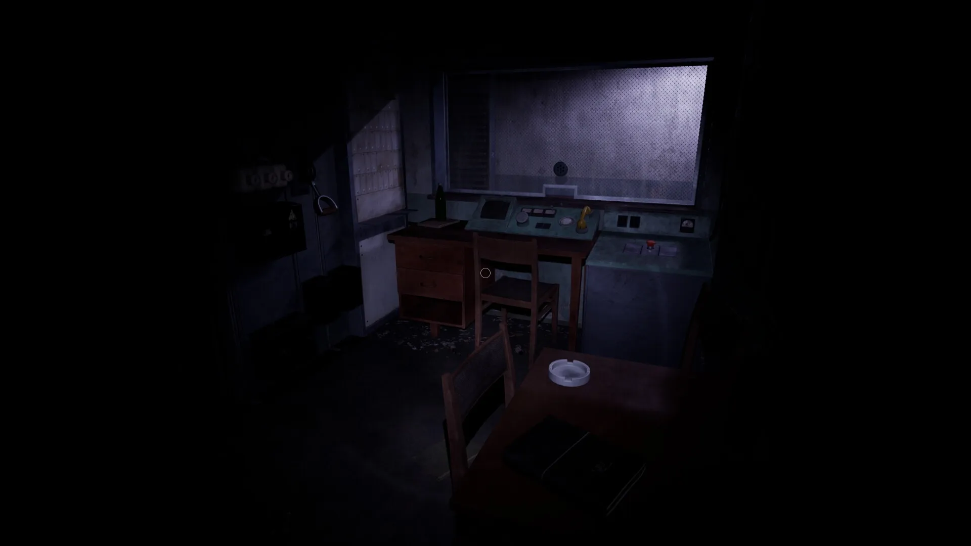 CONFINED: Dimly lit control room with old equipment and a desk in an abandoned soviet bunker