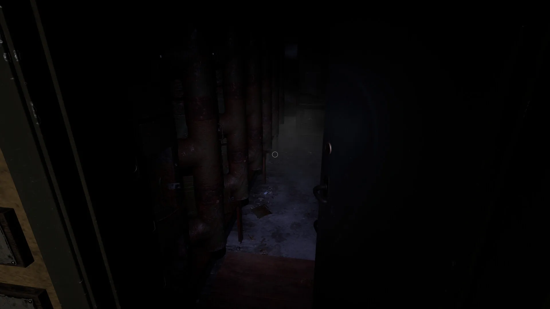 CONFINED: Dark corridor with rusty pipes and dim lighting in an abandoned soviet bunker