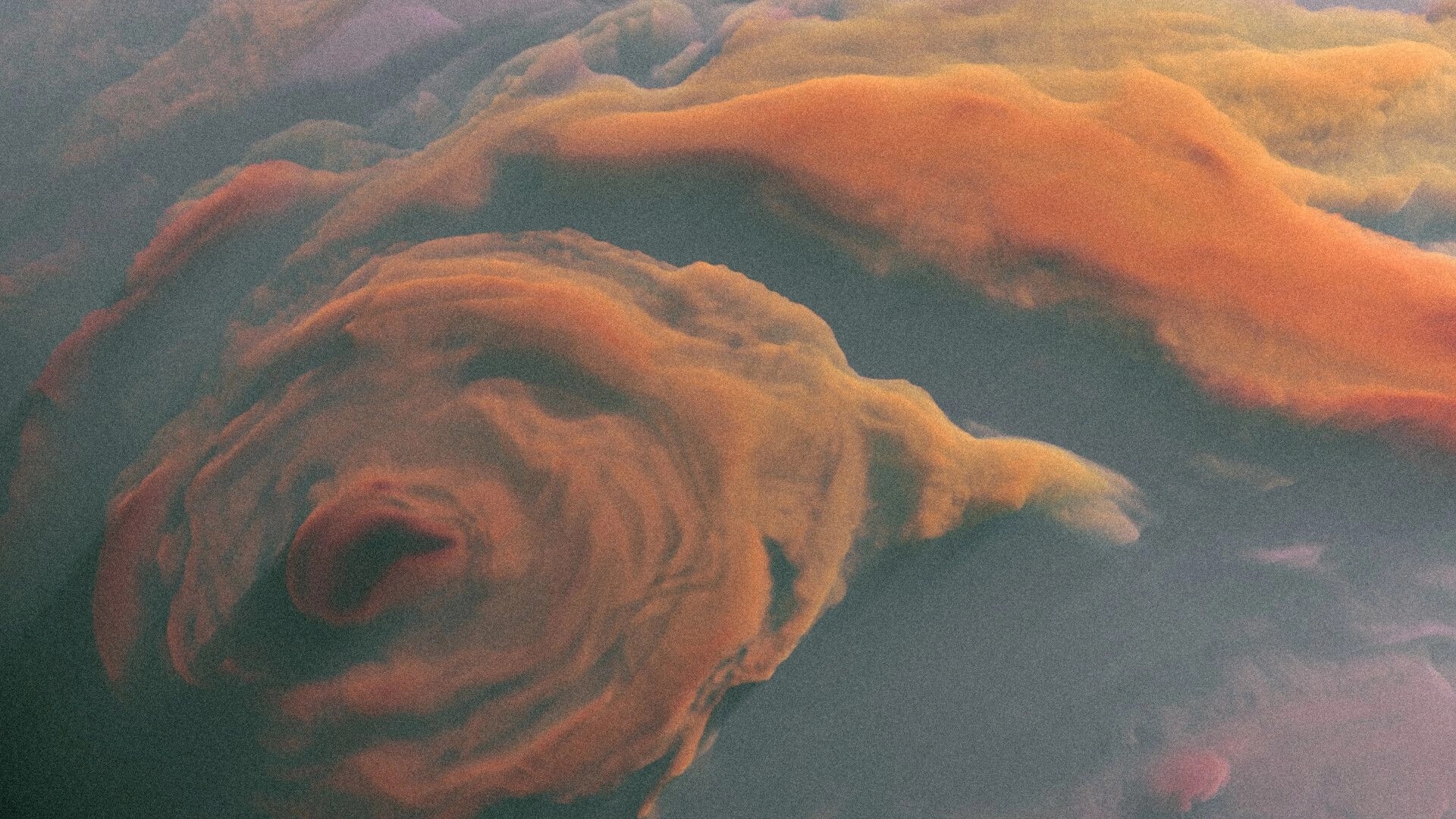 Contact Protocol: Swirling orange storm clouds fill the view in a hazy gas giant atmosphere.