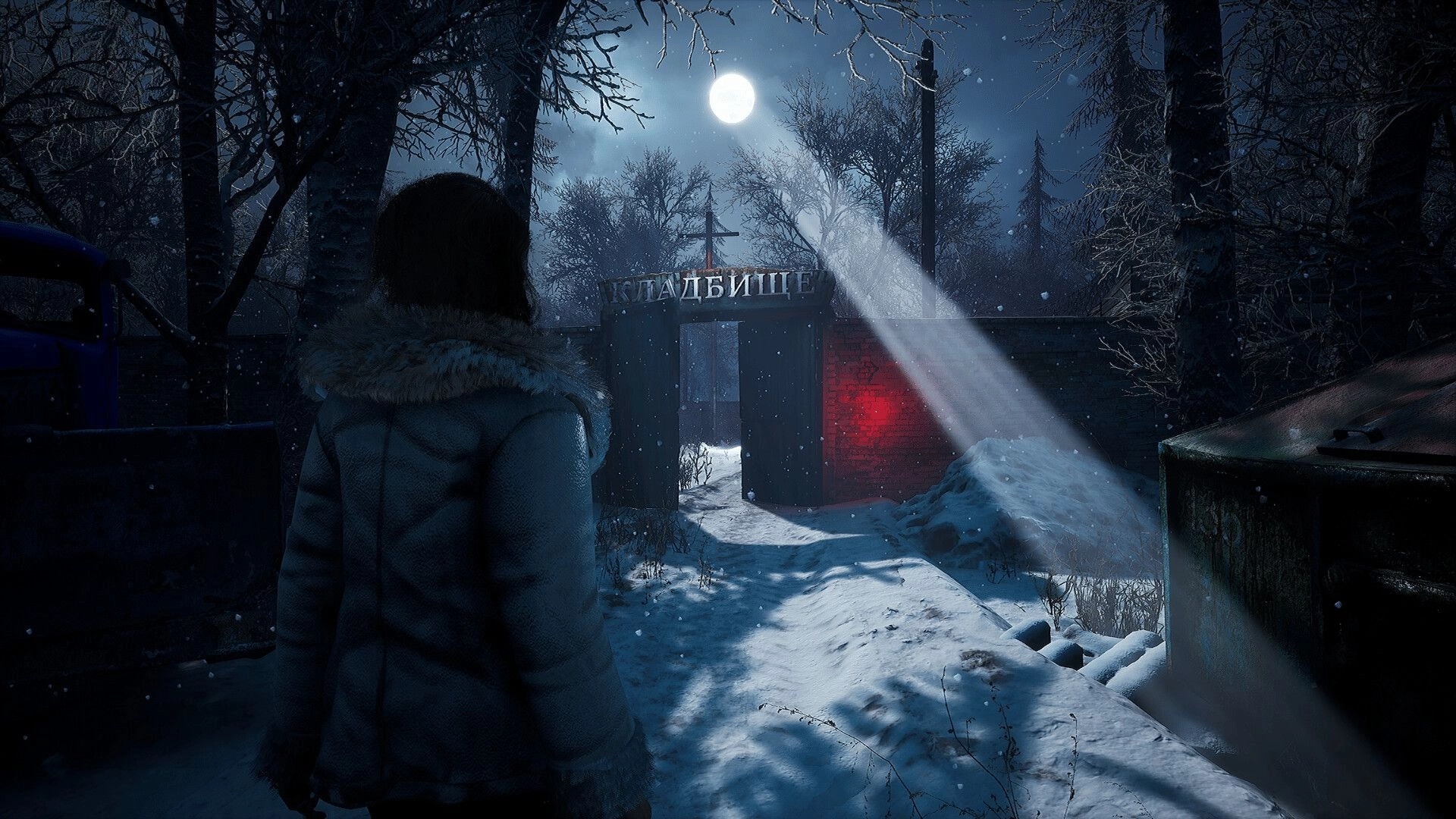 CONTAMINANT: Maria approaches snowy cemetery gate under moonlight in eerie forest environment.