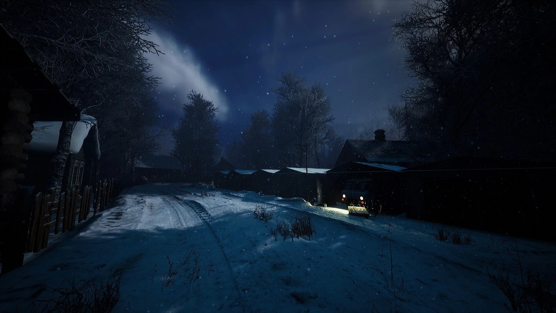 CONTAMINANT: Snowy village at night with vehicle headlights illuminating the path and trees.