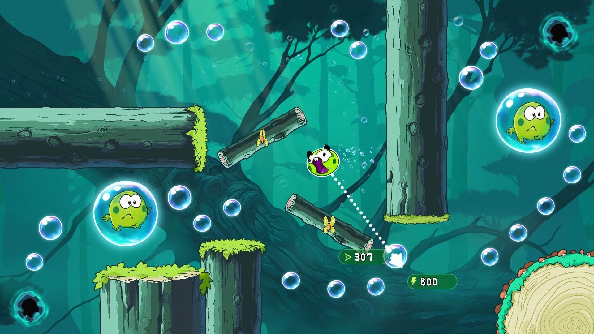 Cool Game Pack: Green creature launching through bubble-filled forest with wooden platforms and score display