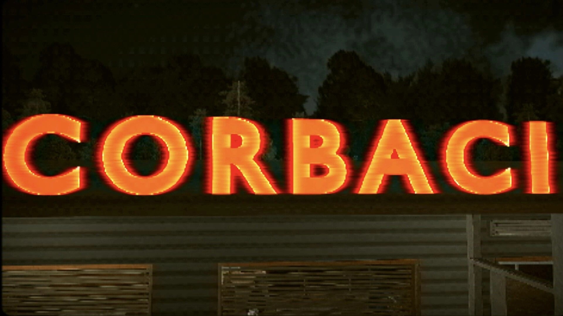 Corbaci: Title screen with large glowing letters against a dark forest background