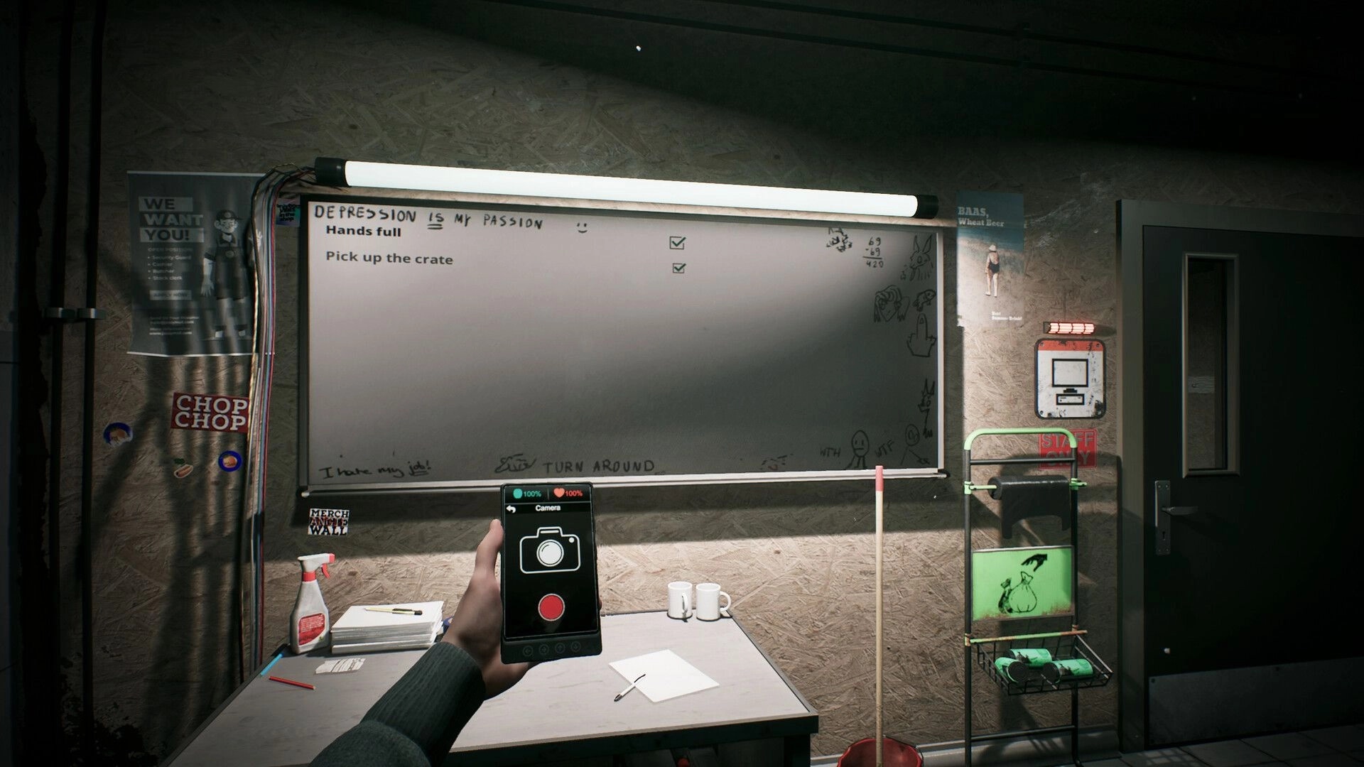 Corner Shop: Player holding phone camera in cluttered back room with whiteboard and cleaning supplies.