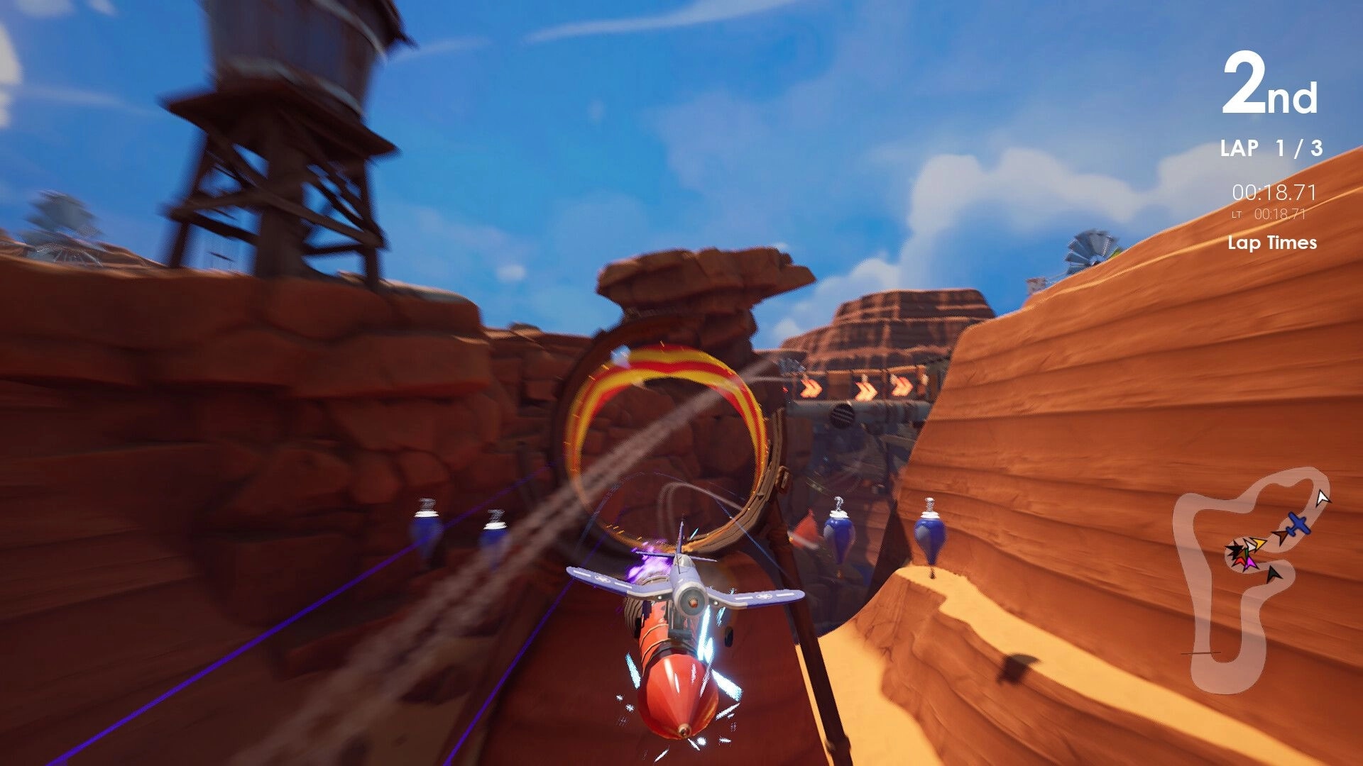 Couch Planes: Plane flying through canyon ring, second place, lap details on screen