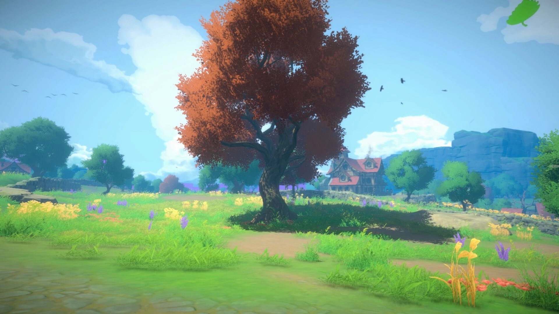Cozy Builder: Red-leaf tree over a flowered meadow, cottage and cliffs under a bright sky.