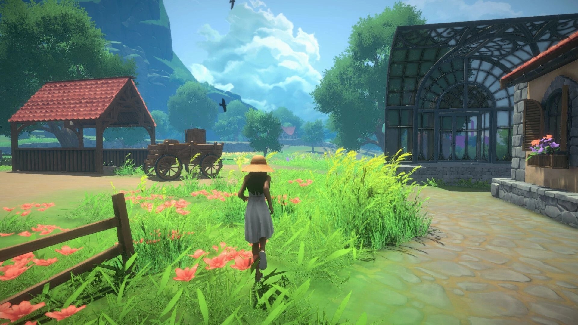 Cozy Builder: Player walks through wildflowers past a cart and glasshouse beside a stone path in valley.