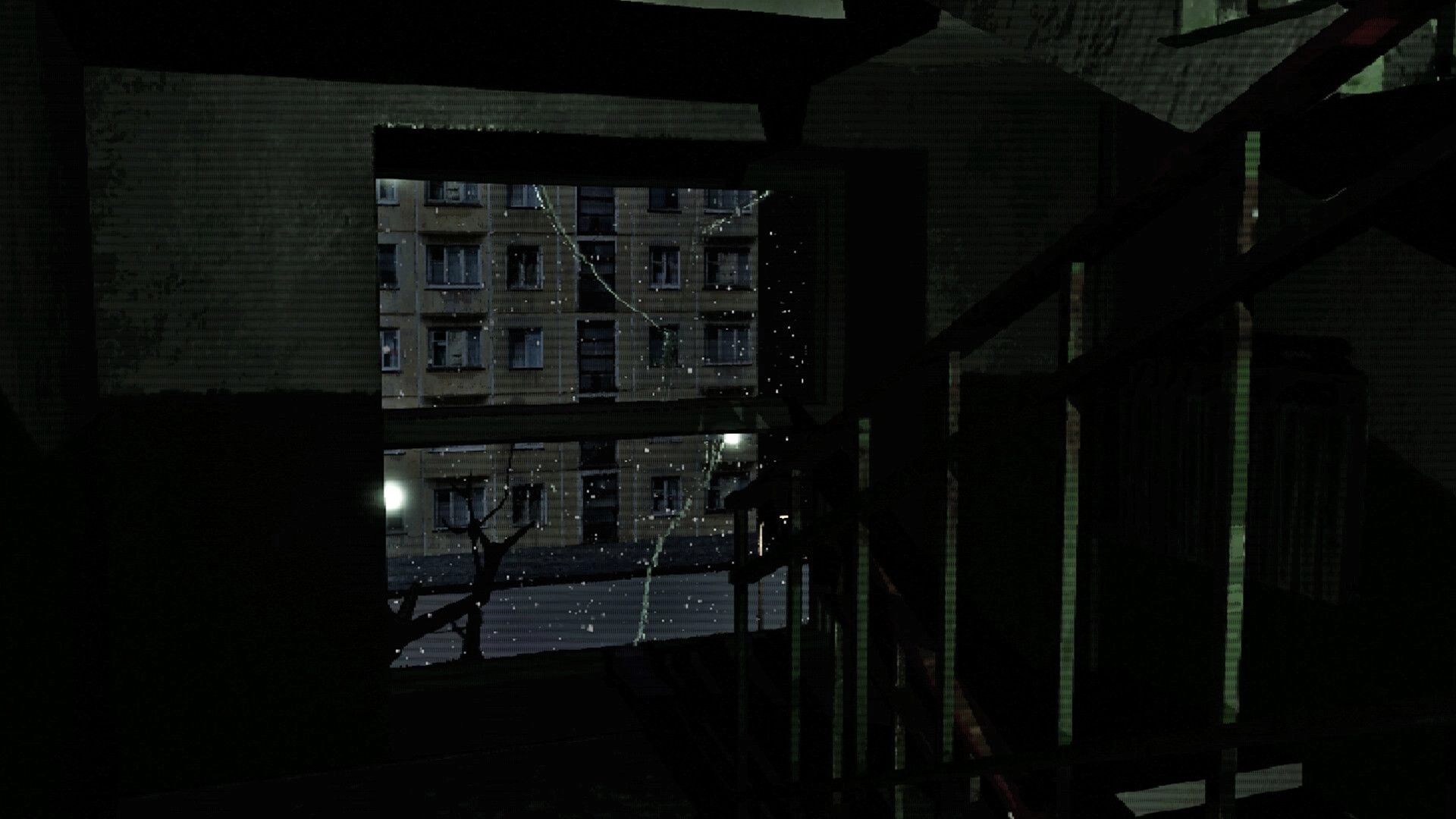 Crazy Neighbour: Looking out a cracked window at snowy apartment blocks from a dark stairwell landing.